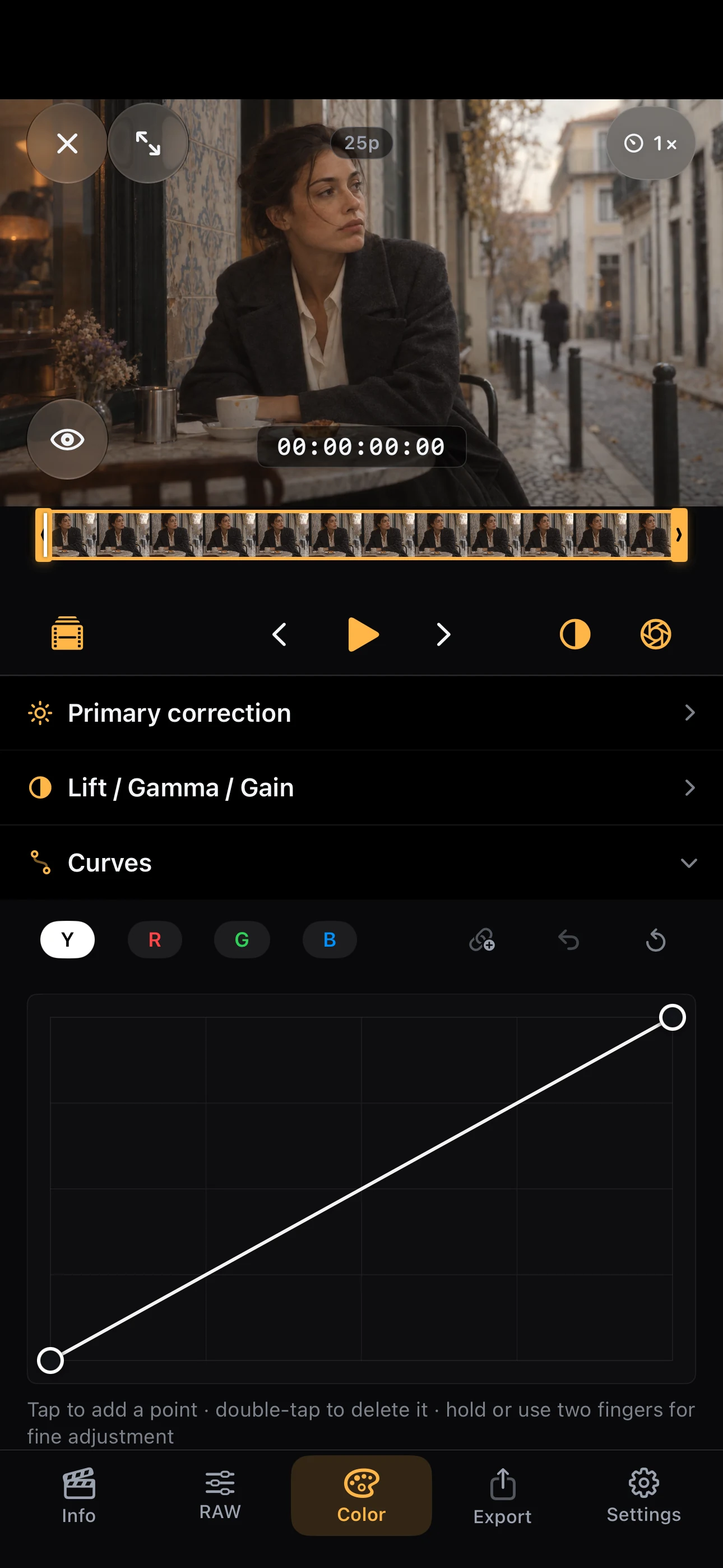 Actual English iPhone simulator capture showing the Curves editor and its channel controls over a landscape-format café scene.